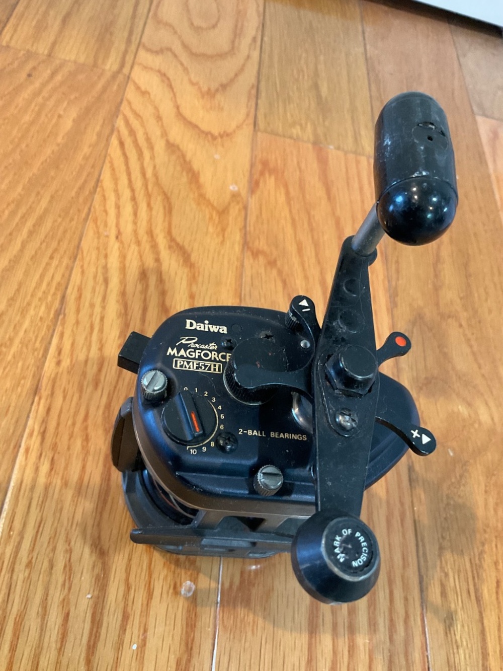 Black Daiwa Procaster Magforce PMF57H Bait Casting Reel